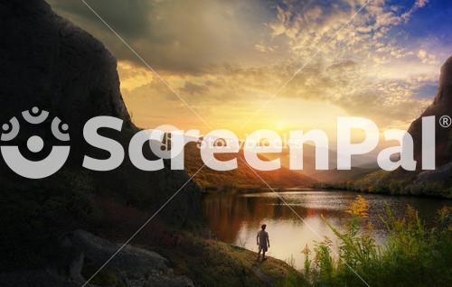 Serene Nature Scene With Majestic Mountains And Peaceful Lake.